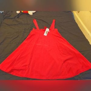 Red dress jumper. Never worn.
